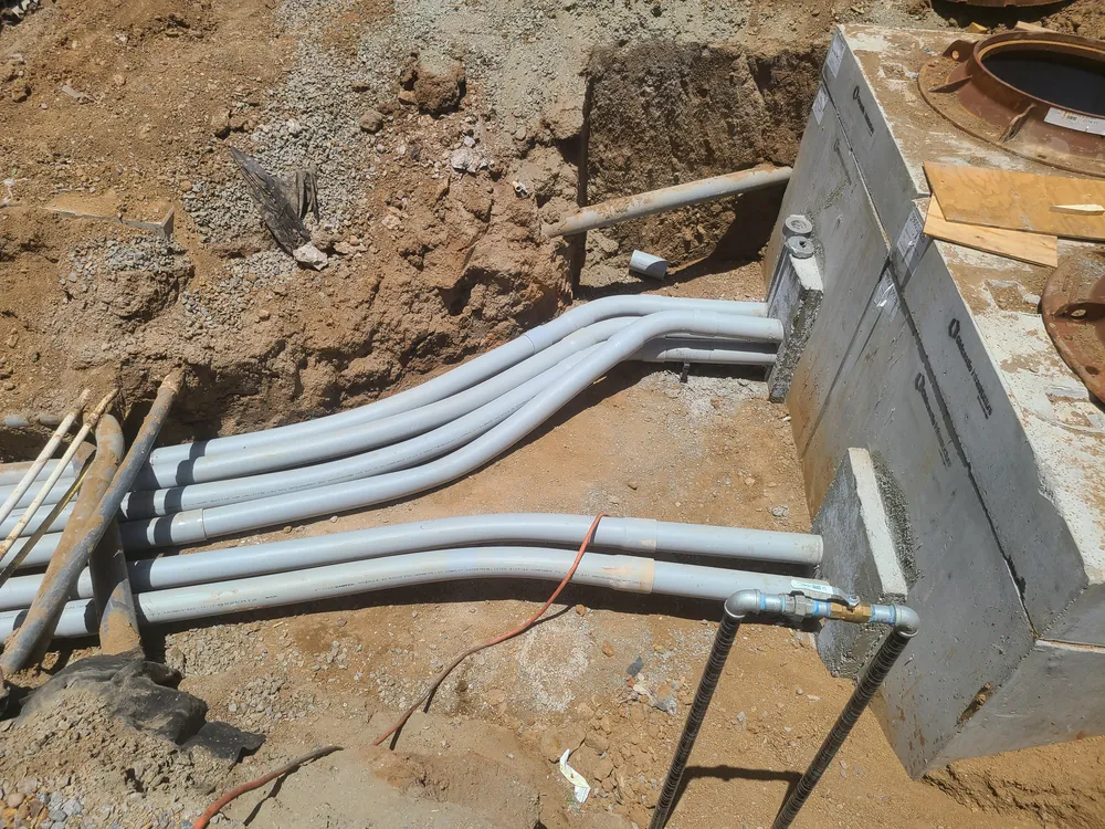 Underground conduit run into a pull box by Brett Hinck Electrical